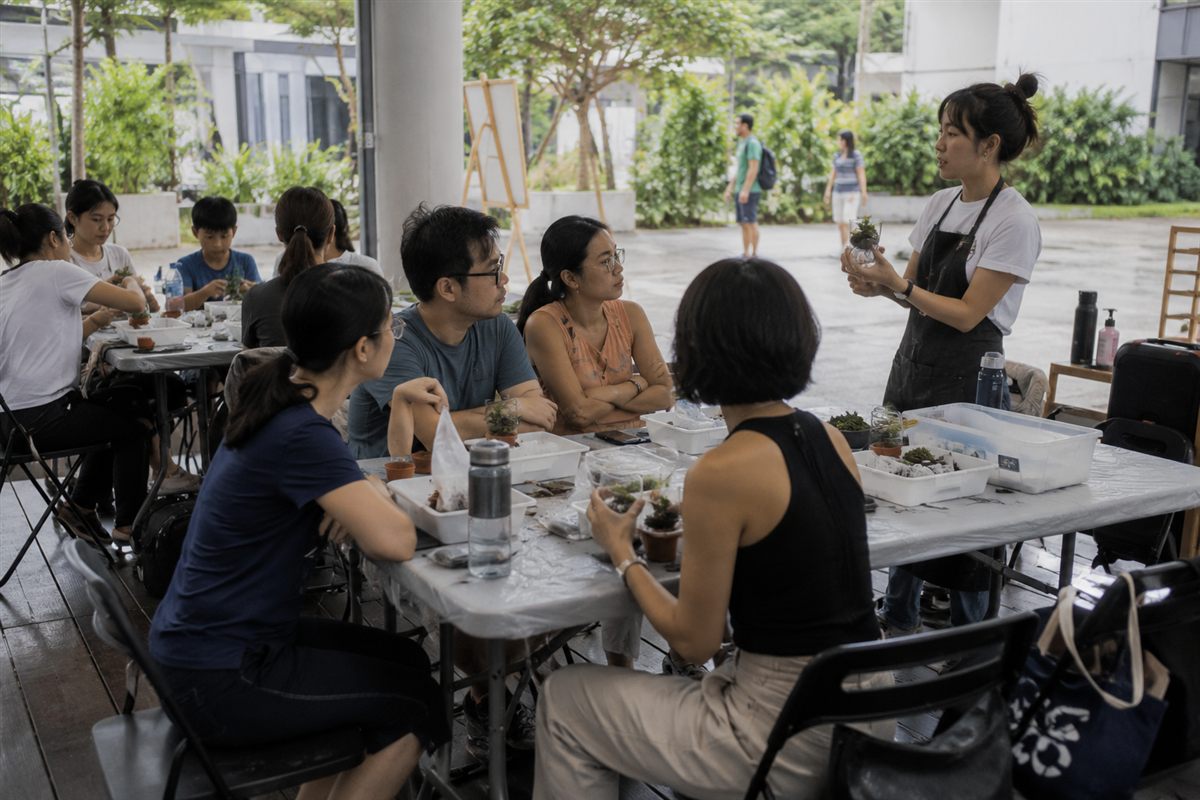 A Singapore activity provider answering WhatsApp enquiries about group bookings and packages