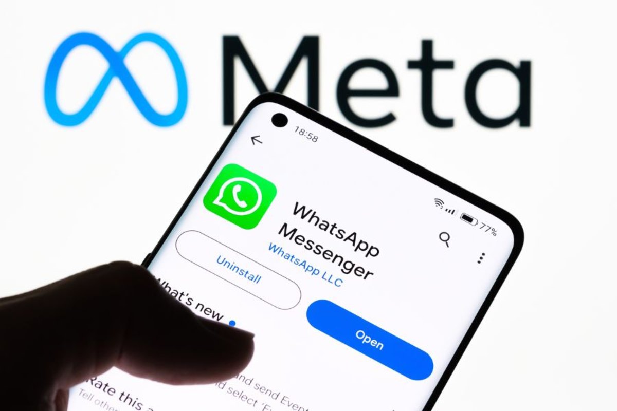 A gym owner reviewing WhatsApp class bookings and reminders on a phone
